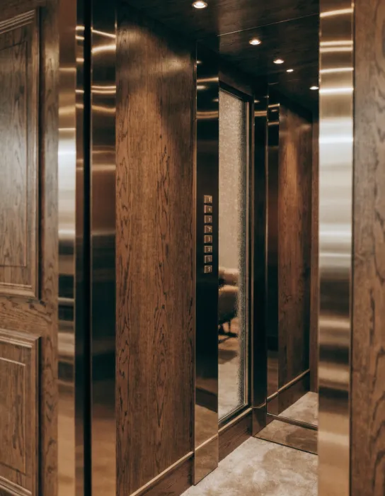 Villa home lift cabin with wood and bronze finish